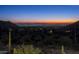 Stunning panoramic view of city lights and mountain landscape at sunset at 10944 E Whistling Wind Way, Scottsdale, AZ 85255