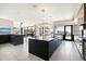 Modern kitchen with large island and top-of-the-line appliances at 10944 E Whistling Wind Way, Scottsdale, AZ 85255