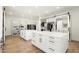 Large walk-in closet with built-in shelving and drawers at 10944 E Whistling Wind Way, Scottsdale, AZ 85255