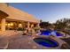 Luxury backyard oasis featuring a stunning pool, spa, and flagstone patio at 12308 N 119Th St, Scottsdale, AZ 85259