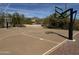 Outdoor basketball court with hoops and ample space for recreational games at 12308 N 119Th St, Scottsdale, AZ 85259