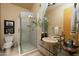 Spa-like bathroom with a large walk-in shower and double vanity at 12308 N 119Th St, Scottsdale, AZ 85259