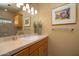 Light and airy bathroom with a modern vanity and large mirror at 12308 N 119Th St, Scottsdale, AZ 85259