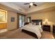 Spacious bedroom with a king-size bed and access to a private patio at 12308 N 119Th St, Scottsdale, AZ 85259