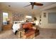 Main bedroom with fireplace and large windows at 12308 N 119Th St, Scottsdale, AZ 85259