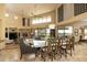 Elegant dining room features a large table with seating for six, and high ceilings at 12308 N 119Th St, Scottsdale, AZ 85259