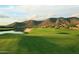 Scenic golf course with water features and mountains at 12308 N 119Th St, Scottsdale, AZ 85259