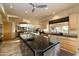 Bright kitchen with an expansive island, custom cabinetry, and a breakfast bar at 12308 N 119Th St, Scottsdale, AZ 85259