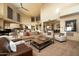 Bright and airy living room with ample seating and a rustic coffee table at 12308 N 119Th St, Scottsdale, AZ 85259