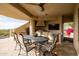 Relaxing outdoor kitchen and dining space with mountain views at 12308 N 119Th St, Scottsdale, AZ 85259