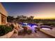 Luxury pool and spa with a nighttime view at 12308 N 119Th St, Scottsdale, AZ 85259