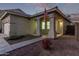 One-story house with a two-car garage and landscaped front yard at 12418 W Pima St, Avondale, AZ 85323