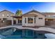 Back exterior view showing the home and pool area at 12418 W Pima St, Avondale, AZ 85323