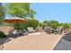 Landscaped backyard with patio and seating area at 12736 W Auburn Dr, Peoria, AZ 85383