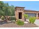 Attractive single-story home with desert landscaping and a two-car garage at 12736 W Auburn Dr, Peoria, AZ 85383