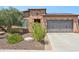 Single-story home with brick facade, solar panels, and landscaped front yard at 12736 W Auburn Dr, Peoria, AZ 85383