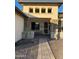 Stone pillars and walkway leading to front door at 12762 W Vista Paseo Dr, Litchfield Park, AZ 85340