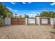 Large backyard with gravel, shed, and covered patio at 1312 E Colter St, Phoenix, AZ 85014