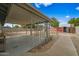 Backyard patio with covered area and view of storage shed at 1312 E Colter St, Phoenix, AZ 85014