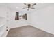 Spacious bedroom with built-in shelving and ceiling fan at 1312 E Colter St, Phoenix, AZ 85014