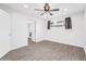 Bedroom with ceiling fan and access to laundry room at 1312 E Colter St, Phoenix, AZ 85014