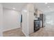 Modern kitchen with stainless steel appliances and tile flooring at 1312 E Colter St, Phoenix, AZ 85014