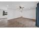 Bright living room with tile flooring and ceiling fan at 1312 E Colter St, Phoenix, AZ 85014