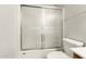 Clean bathroom with a shower/tub combo and updated fixtures at 13292 W Statler St, Surprise, AZ 85374