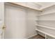 White closet with shelves and hanging rods at 13292 W Statler St, Surprise, AZ 85374