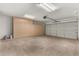 Garage with built-in storage cabinets and an automatic opener at 13292 W Statler St, Surprise, AZ 85374