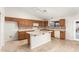 Kitchen with light wood cabinets and tile backsplash at 13292 W Statler St, Surprise, AZ 85374