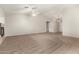 Large living room with carpeted floor and neutral color scheme at 13292 W Statler St, Surprise, AZ 85374