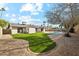 Large backyard with a swimming pool and artificial turf at 14402 N 45Th St, Phoenix, AZ 85032