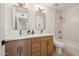 Modern bathroom with double vanity and a bathtub at 14402 N 45Th St, Phoenix, AZ 85032