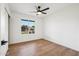 Well-lit bedroom with ceiling fan and large window at 14402 N 45Th St, Phoenix, AZ 85032