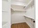 Large walk-in closet with shelving and hanging rods at 14402 N 45Th St, Phoenix, AZ 85032