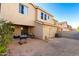 Small backyard with grill and gravel ground at 14518 W Port Royale Ln, Surprise, AZ 85379