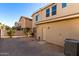 Backyard with gravel, grill, and partial fence view at 14518 W Port Royale Ln, Surprise, AZ 85379