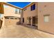 Two-car garage and private patio with spacious area at 14518 W Port Royale Ln, Surprise, AZ 85379