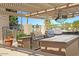 Outdoor BBQ area with multiple grills and seating at 1621 E Firestone Dr, Chandler, AZ 85249