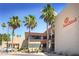 Sunbird community building with palm trees and American flag at 1621 E Firestone Dr, Chandler, AZ 85249