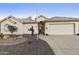 Single-story house with a two-car garage and desert landscaping at 1621 E Firestone Dr, Chandler, AZ 85249