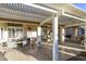 Outdoor patio with pergola, seating area, and built-in grill at 1621 E Firestone Dr, Chandler, AZ 85249