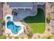 Backyard with kidney shaped pool, spa and putting green at 1684 E Coconino Dr, Chandler, AZ 85249