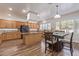 Kitchen with island, wood cabinets, and breakfast nook at 1684 E Coconino Dr, Chandler, AZ 85249