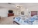 Main bedroom with TV, fireplace, and ample closet space at 1684 E Coconino Dr, Chandler, AZ 85249