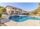 Inviting kidney-shaped pool with spa and waterfall feature at 1684 E Coconino Dr, Chandler, AZ 85249