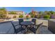 Pool area with patio furniture and umbrellas at 1684 E Coconino Dr, Chandler, AZ 85249