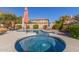 Relaxing spa with blue tile and waterfall feature at 1684 E Coconino Dr, Chandler, AZ 85249