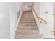 Carpeted staircase leading to the upper level of the home at 1684 E Coconino Dr, Chandler, AZ 85249